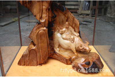 佛缘匠心 红豆杉木雕老子出关的艺术魅力